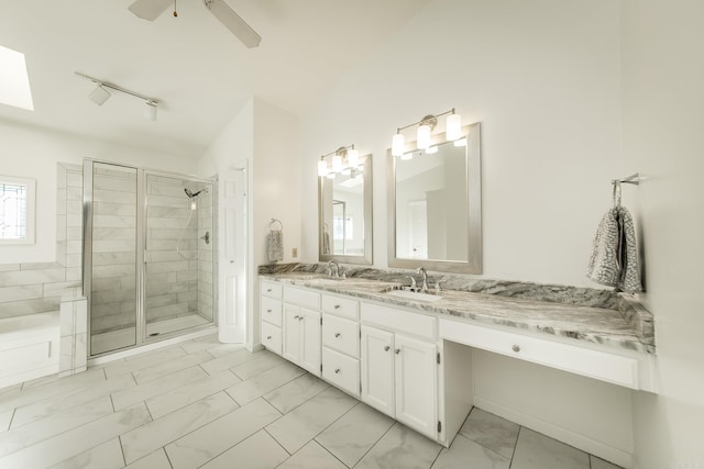 bathroom featuring vanity, ceiling fan, an enclosed shower, and track lighting