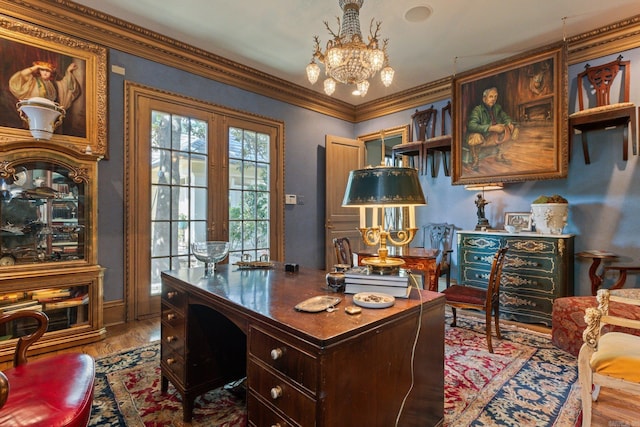 office featuring hardwood / wood-style flooring, french doors, crown molding, and an inviting chandelier