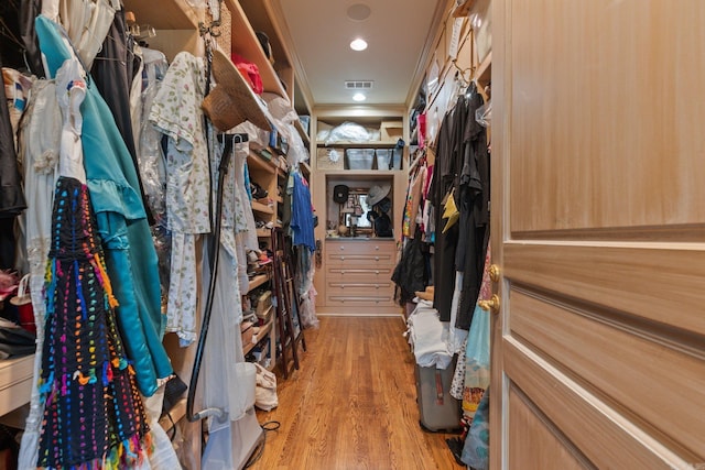 walk in closet featuring light wood-type flooring