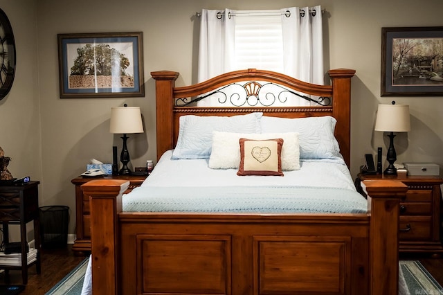 bedroom featuring dark wood-type flooring