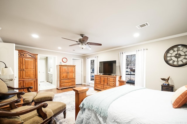 bedroom featuring ensuite bathroom, ceiling fan, ornamental molding, and light hardwood / wood-style flooring