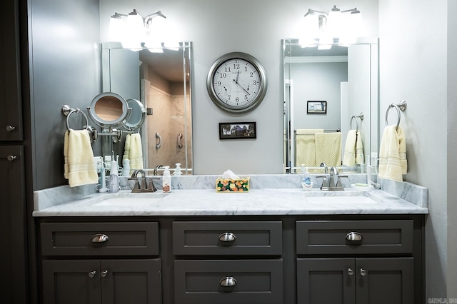 bathroom featuring vanity and ornamental molding