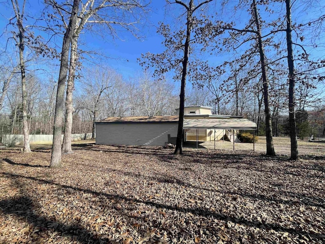 view of property exterior featuring a carport