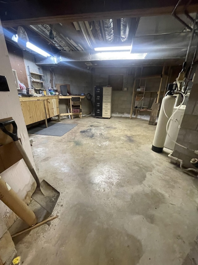 basement featuring a workshop area