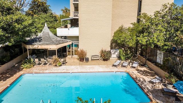 view of pool featuring a patio