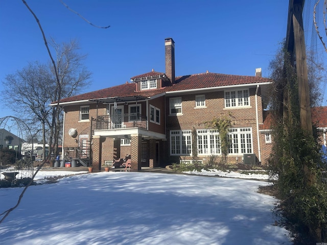 view of snow covered property