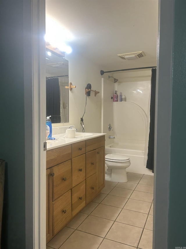 full bathroom with toilet, tile patterned flooring, vanity, and shower / tub combo with curtain