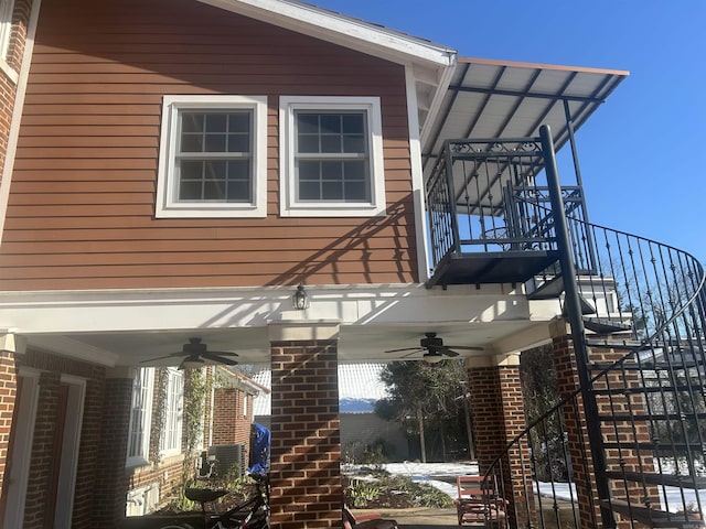 view of property exterior with ceiling fan