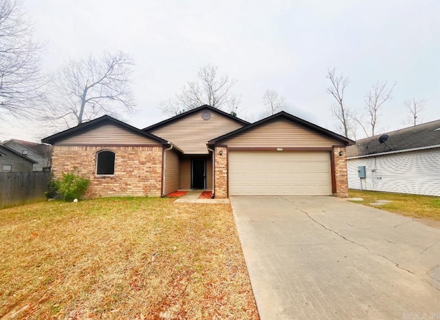 ranch-style home with a garage and a front lawn