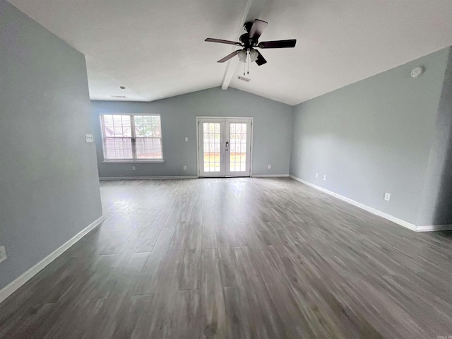 spare room with french doors, dark hardwood / wood-style flooring, lofted ceiling with beams, and ceiling fan