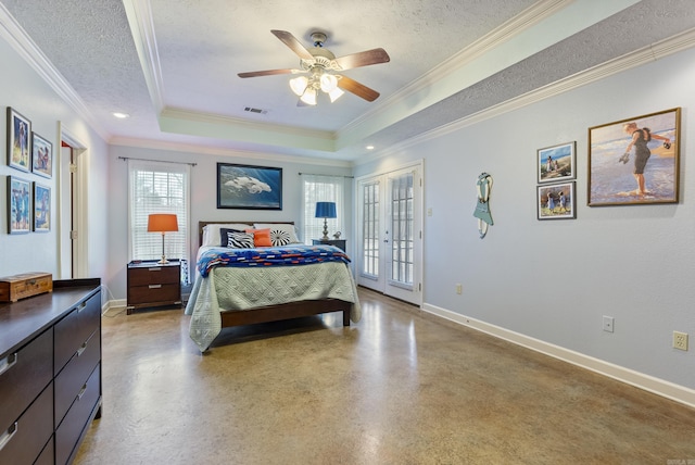 bedroom featuring crown molding, ceiling fan, access to exterior, a textured ceiling, and a tray ceiling