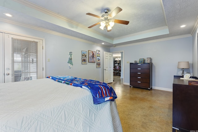 bedroom with ceiling fan, a raised ceiling, ornamental molding, and a textured ceiling