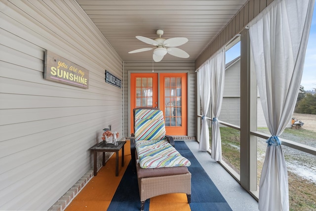 sunroom / solarium with ceiling fan and plenty of natural light