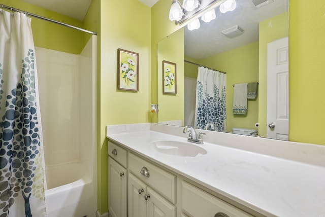 full bathroom featuring vanity, toilet, and shower / bathtub combination with curtain