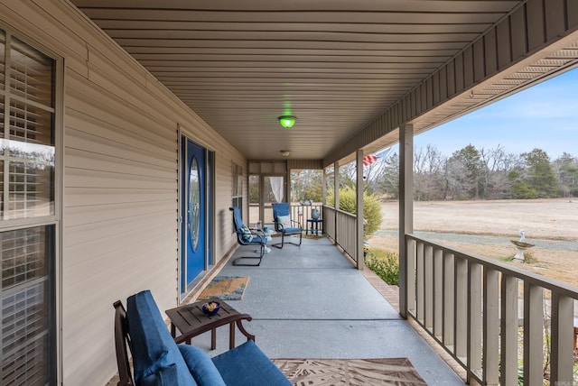 view of patio featuring a porch