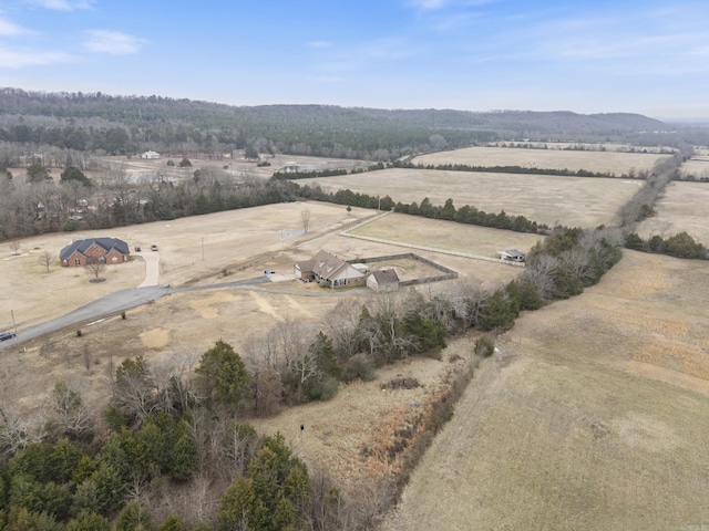 birds eye view of property with a rural view