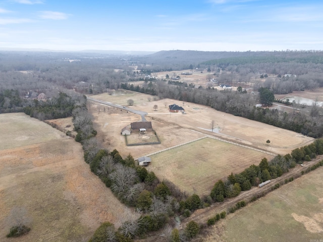 birds eye view of property with a rural view