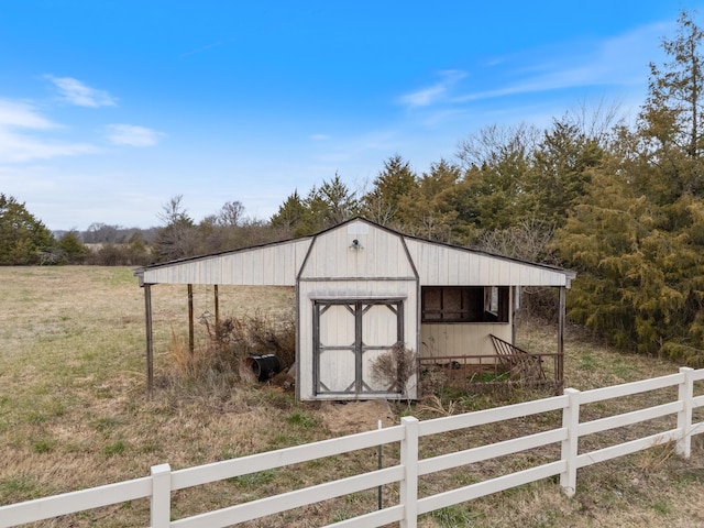 view of outdoor structure featuring a rural view