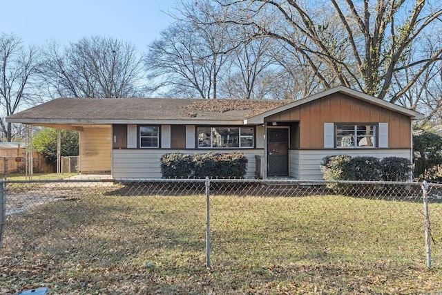 single story home with a front yard and a carport