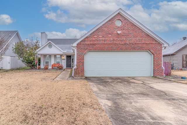 view of front of house featuring covered porch and a garage