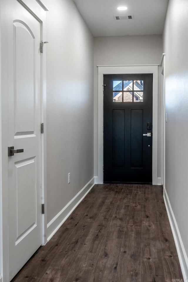 doorway featuring dark hardwood / wood-style flooring