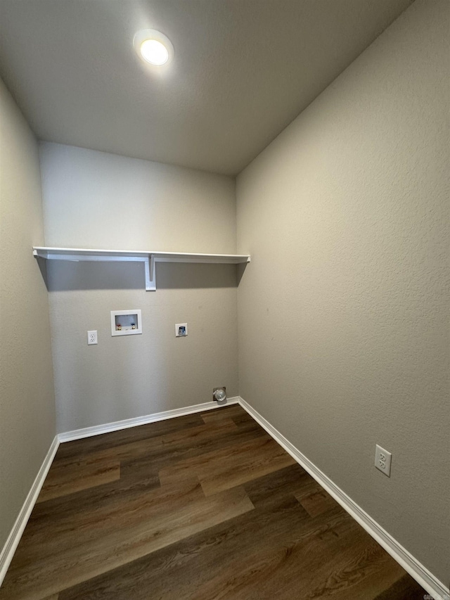 laundry room featuring laundry area, dark wood-type flooring, baseboards, and washer hookup