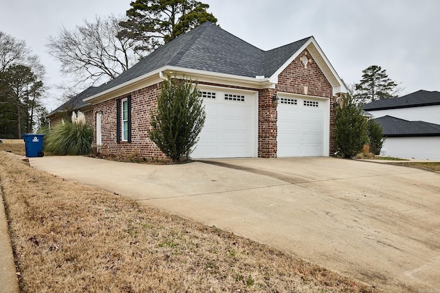 view of side of property featuring a garage