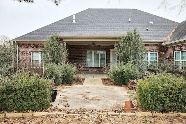 rear view of house featuring a patio and ceiling fan