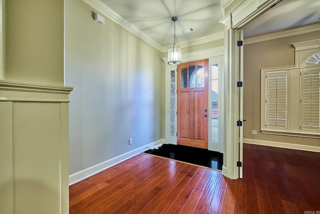 foyer featuring hardwood / wood-style flooring and ornamental molding