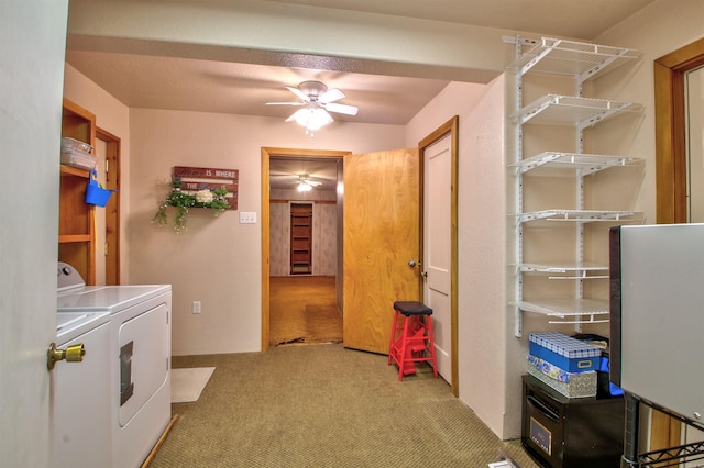 washroom with ceiling fan, light colored carpet, and independent washer and dryer