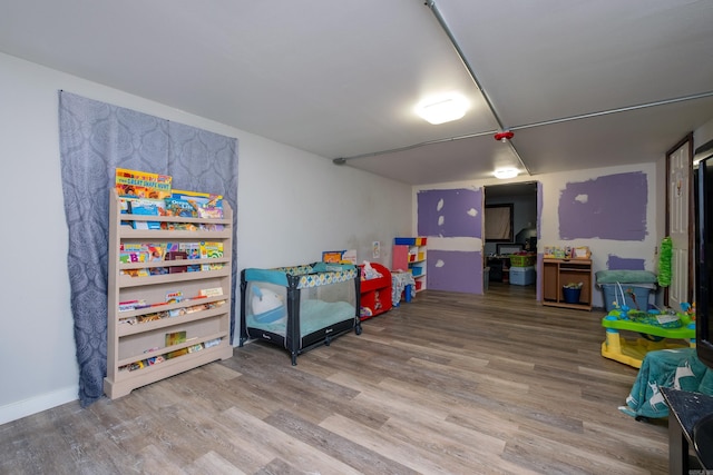 rec room featuring hardwood / wood-style flooring