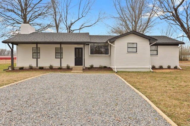 view of front of house featuring a front yard and a porch