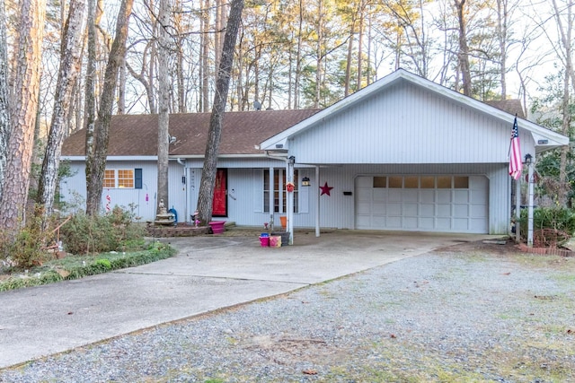 ranch-style home featuring a garage