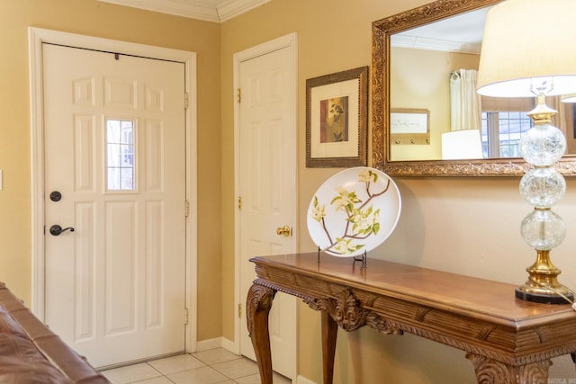 tiled entrance foyer with ornamental molding