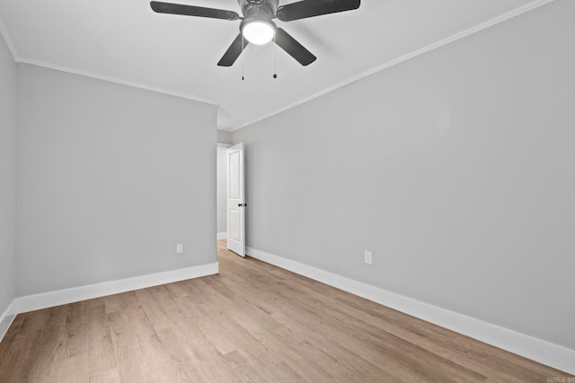 empty room with ceiling fan, light hardwood / wood-style floors, and ornamental molding