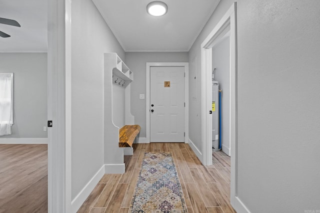 mudroom with ceiling fan and water heater