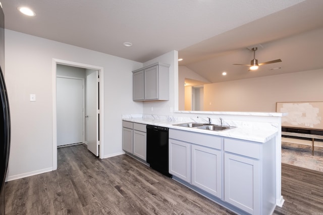 kitchen featuring kitchen peninsula, dark hardwood / wood-style flooring, ceiling fan, sink, and black dishwasher