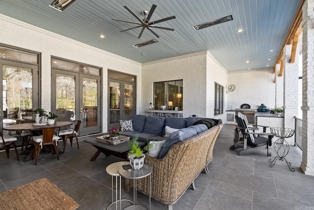 exterior space featuring french doors and an outdoor hangout area