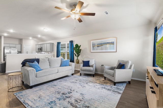 living room with ceiling fan and dark wood-type flooring