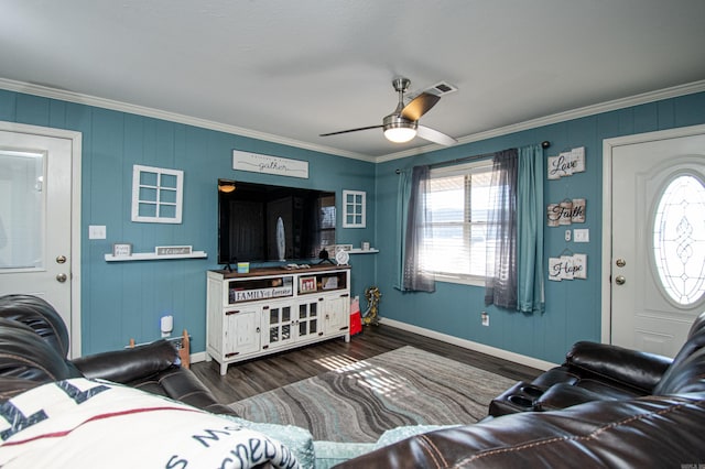 living room featuring dark hardwood / wood-style flooring, ceiling fan, and crown molding