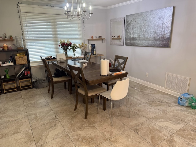 dining area featuring crown molding and a notable chandelier