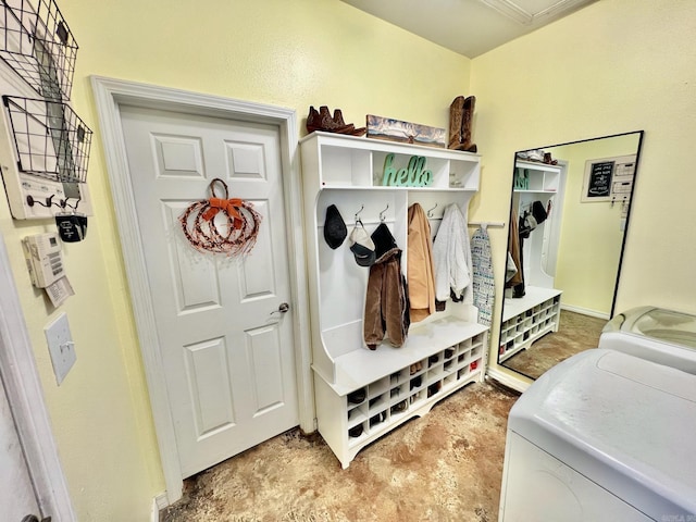 mudroom with washing machine and clothes dryer