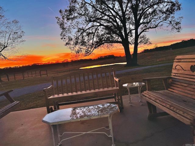 view of patio terrace at dusk