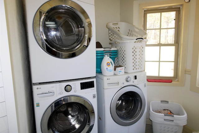 washroom with stacked washer / dryer