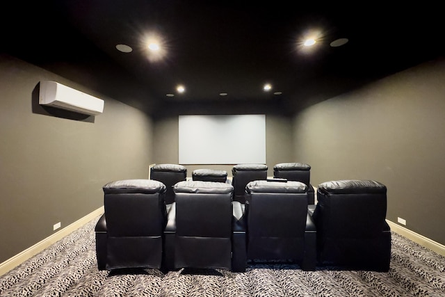 carpeted cinema room with an AC wall unit