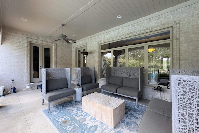 view of patio / terrace with an outdoor living space and ceiling fan