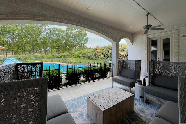 view of patio / terrace featuring ceiling fan