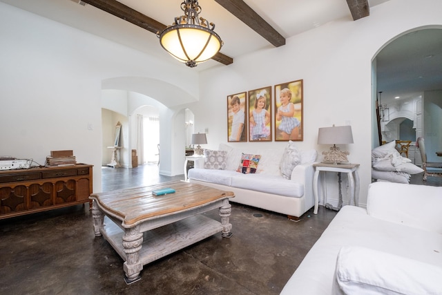 living room with beam ceiling