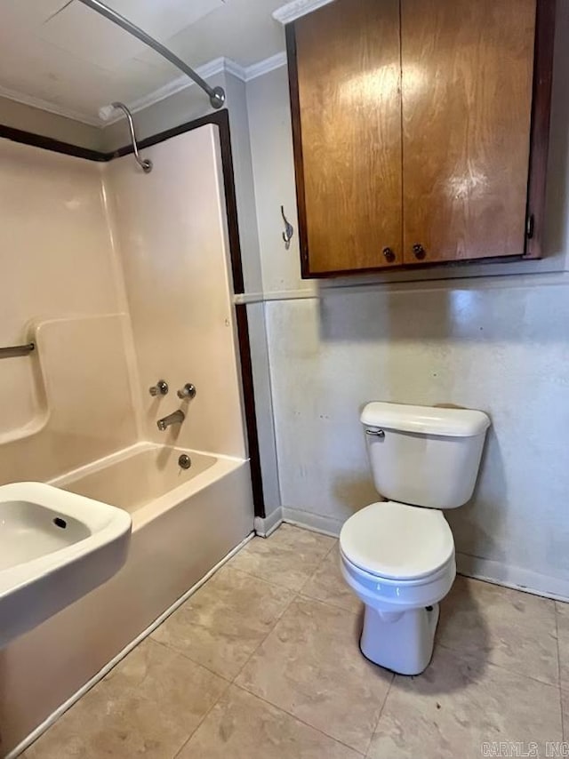 bathroom with toilet, bathing tub / shower combination, and ornamental molding