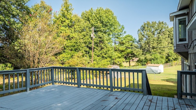 deck featuring a lawn